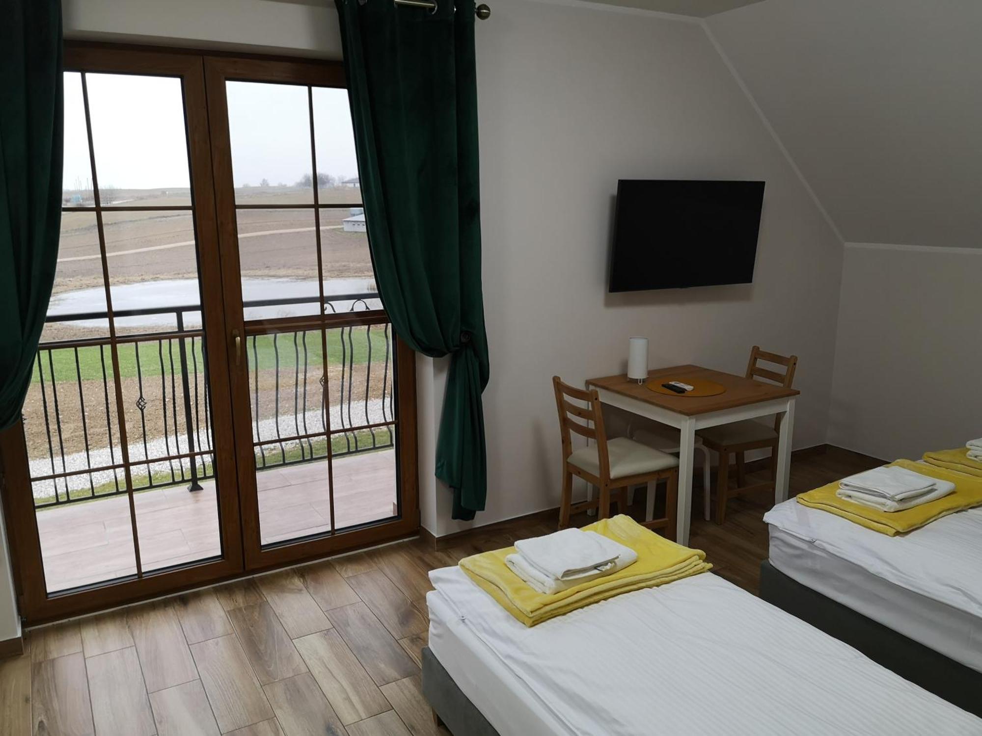 Apartamenty, Zielone Wzgorze Wiktora W Mikolajkach Міколайкі Номер фото